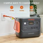 Jackery Portable off-grid power station with solar panels for outdoor living.
